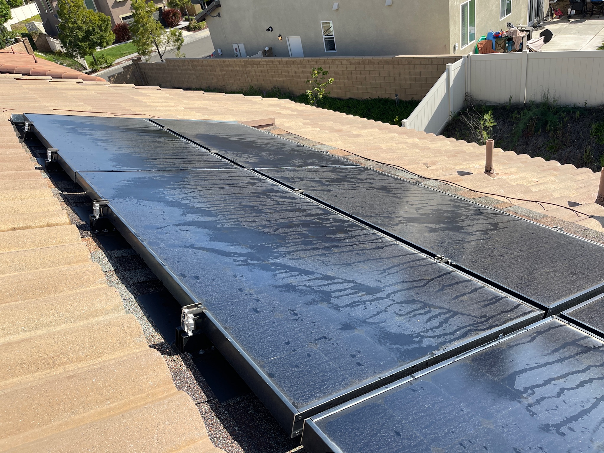 picture of customer needing solar panel cleaning service due to dirt build up